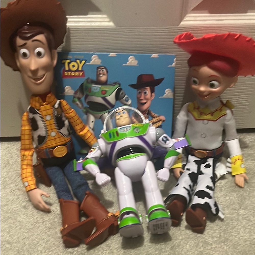 Toy Story Action Figure Set - Woody, Buzz Lightyear, and Jessie Comes with book.